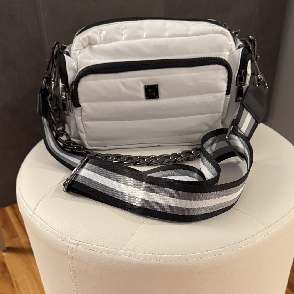 THINK ROYLN Quilted Crossbody Bag in White with Black Details